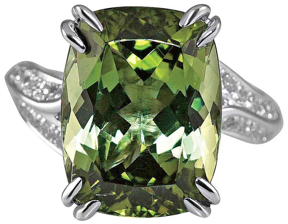 Marcy custom ring in platinum with a 7 ct. cushion green tourmaline