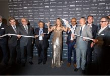 Elizabeth Hurley cuts the ceremonial ribbon to officially open CARAT+ 2018.