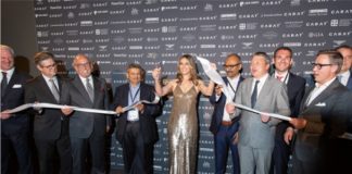 Elizabeth Hurley cuts the ceremonial ribbon to officially open CARAT+ 2018.