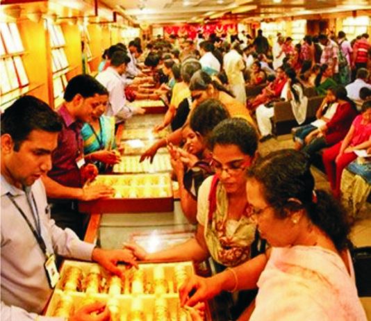 Gold continues to slide on weak global cues, muted demand Gold continues to slide on weak global cues, muted demand