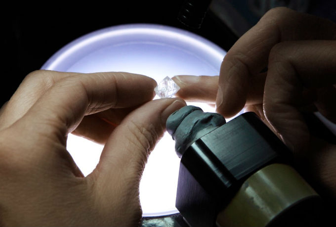 Diamond inspection at a Tiffany Diamond Academy workshop