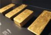 Gold prices subdued as dollar extends rally