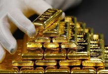 Gold dips as equities gain ahead of Fed policy meeting