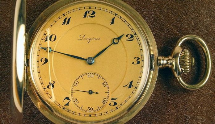 An old Longines pocket gold watch