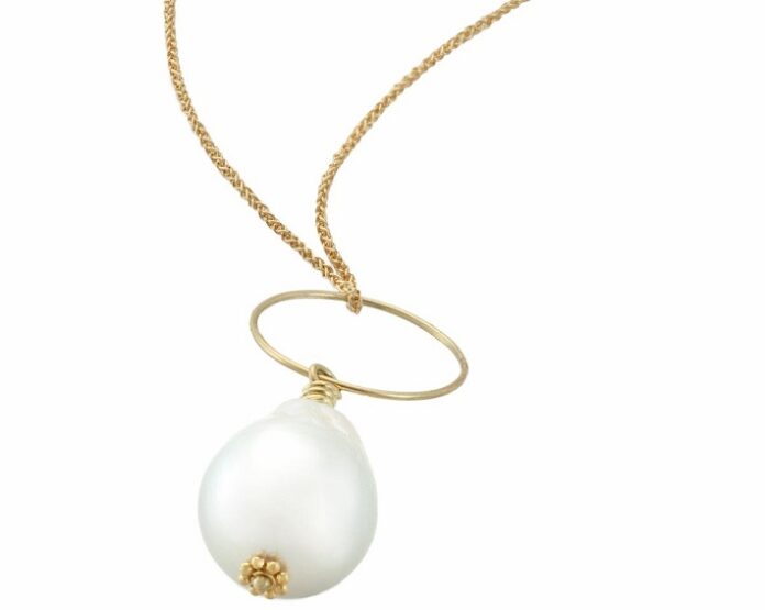 Christina Malle Supports Pure Earth's Auction with Necklace