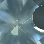 This alphanumeric identifier is less than 50 μm across and is not visible at 40x magnification.