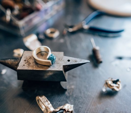 Different jewelery on the table from the jeweler from a close angle
