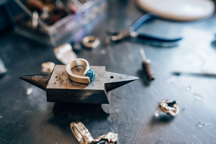 Different jewelery on the table from the jeweler from a close angle