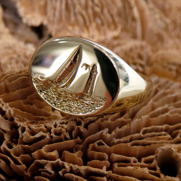 Boat and lighthouse ring