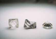 De Beers Reduces First-Half Losses as Higher Volumes Offset Weak Diamond Prices De Beers Reduces First-Half Losses as Higher Volumes Offset Weak Diamond Prices